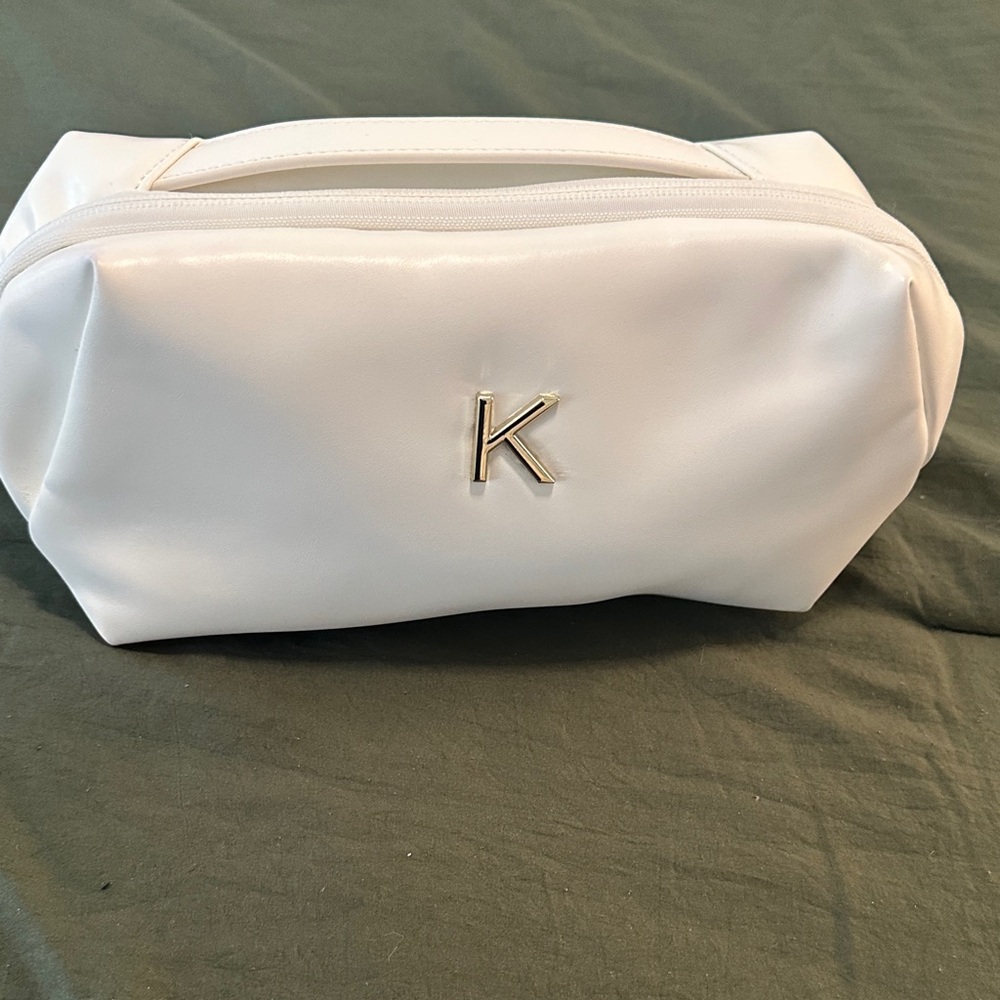 White Cosmetic Pouch with Gold 'K' Accent